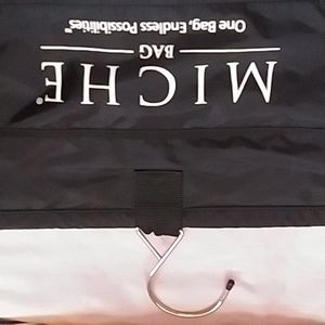 Prima Miche bag cover and straps closet holder system